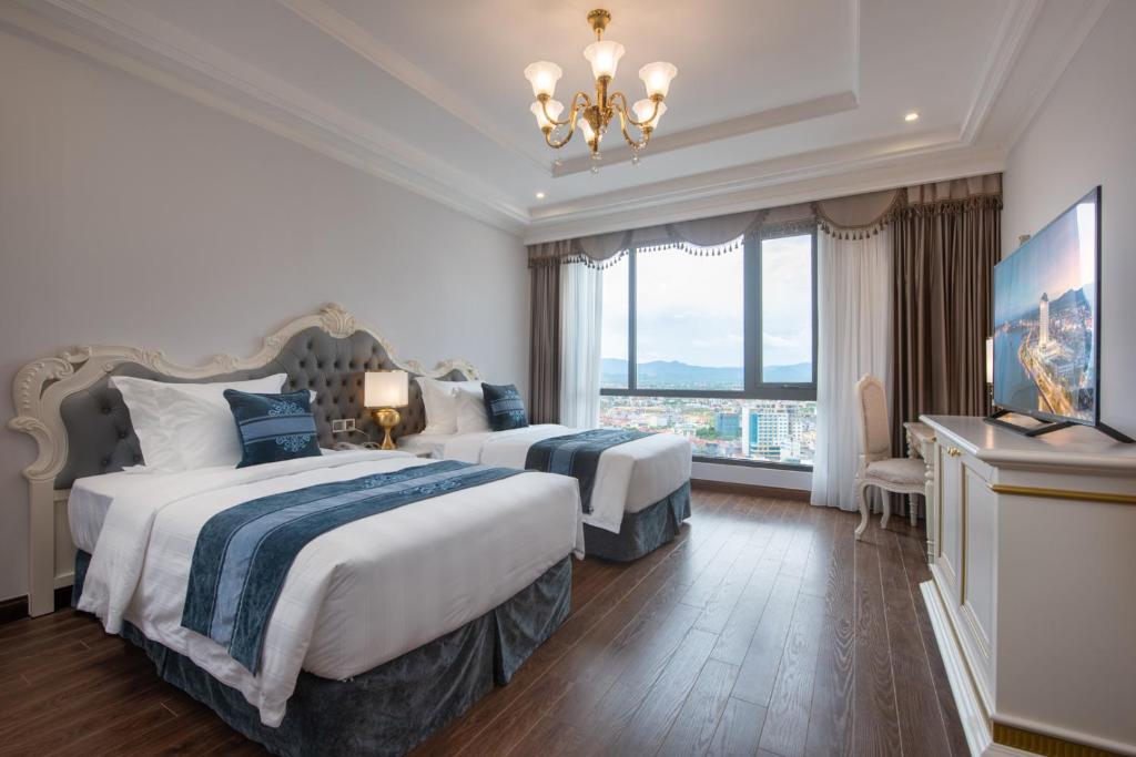 media/roomtypes/090121085742/gallery/vinpearl-hotel-quang-binh-duluxe-city-view.jpg