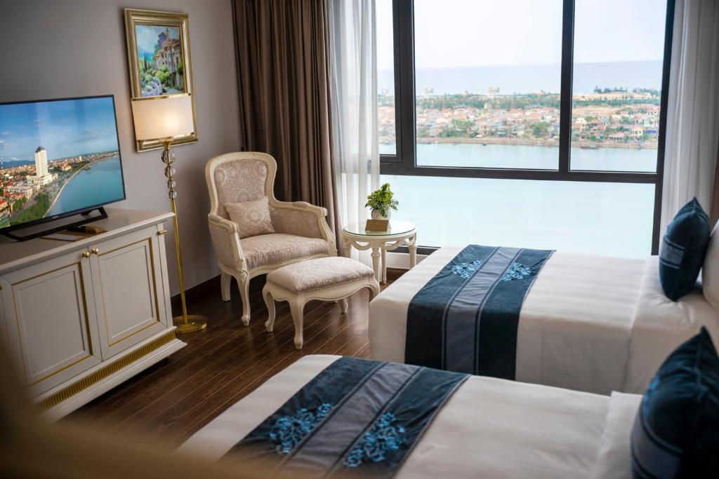 media/roomtypes/090121085826/gallery/vinpearl-hotel-quang-binh-duluxe-river-view-1.jpg